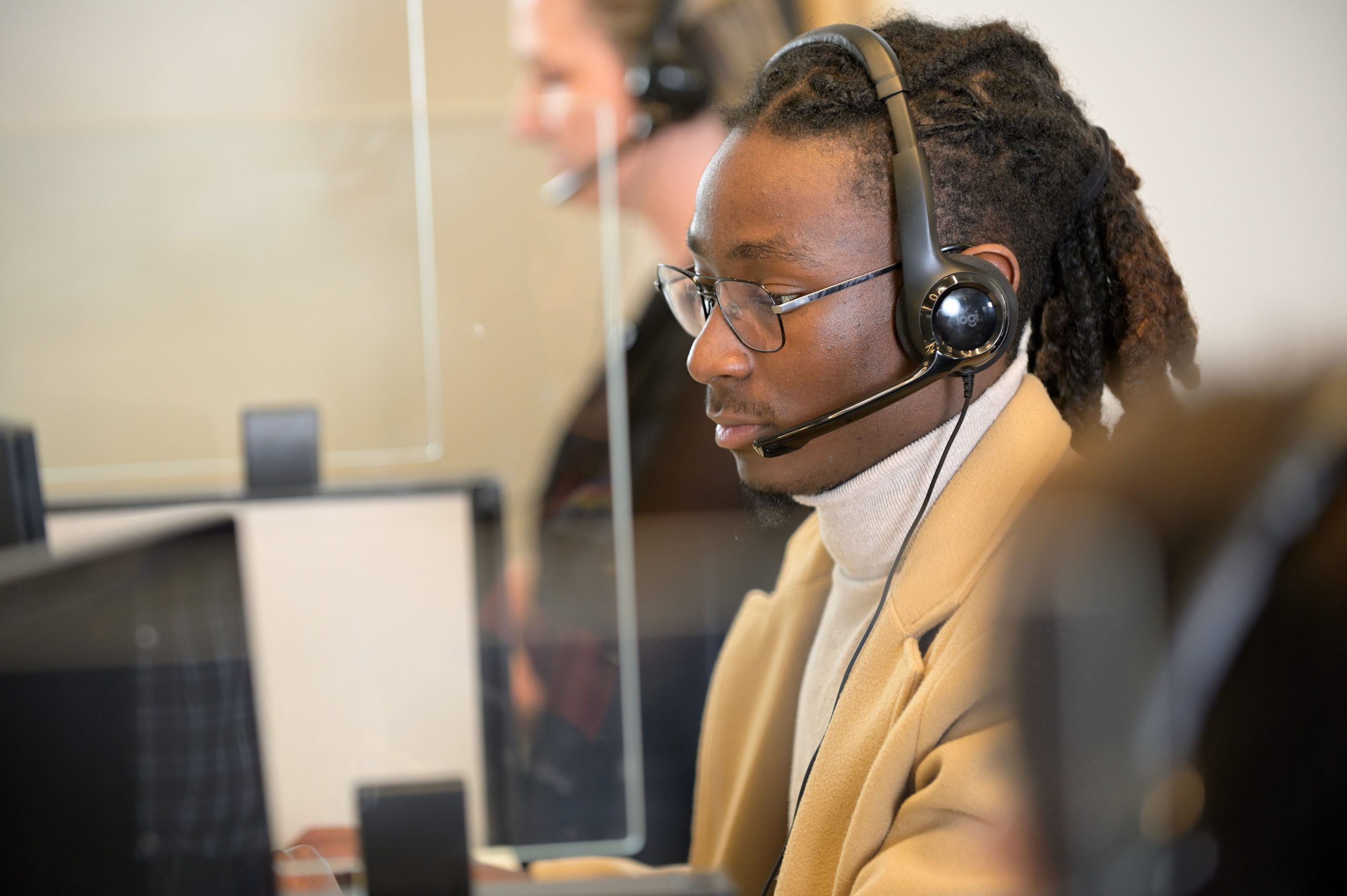 Our Solutions Man working in call center